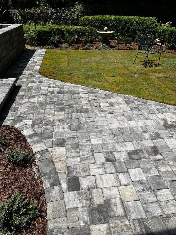 Stone patio and curved garden walkway shown on C and L's site